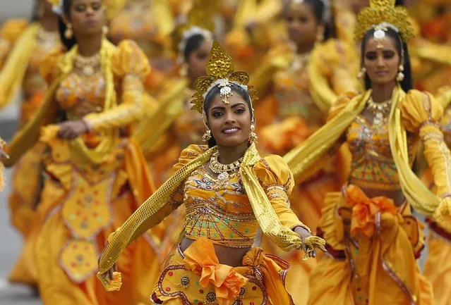 Traditional dancers perform during Sri Lanka's 67th Independence day celebrations in Colombo February 4,2015. (Photo by Dinuka Liyanawatte/Reuters)