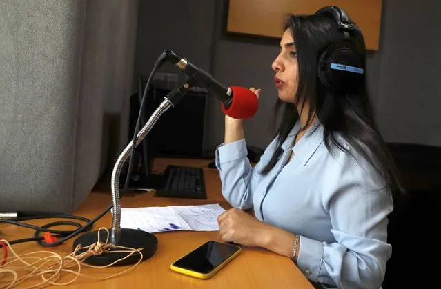 Palestinian journalist Rewaa Mershid works at the studio of ZMN FM radio station in Gaza City, Thursday, May 6, 2021. Mershid, a 26-year-old reporter for a local radio station, was with colleagues filming at a privately owned farm near the heavily guarded Gaza frontier on April 25 when two members of a Hamas-run border patrol approached and asked them to identify themselves. (Photo by Adel Hana/AP Photo)