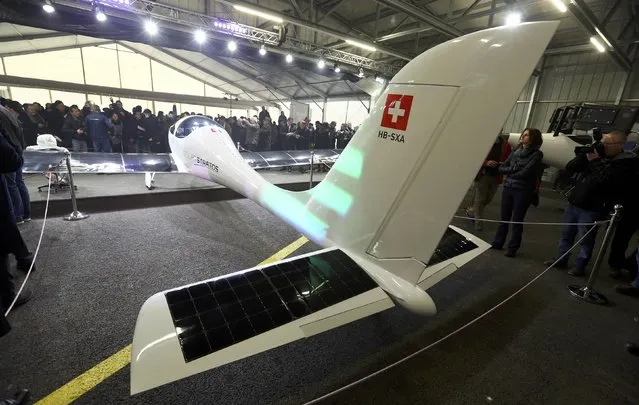Solarstratos, a solar-powered two-seater aircraft with a mission to fly some 24,000m (78,000 feet) above earth set to take place in 2018, is pictured during the roll out presentation in Payerne, Switzerland December 7, 2016. (Photo by Denis Balibouse/Reuters)