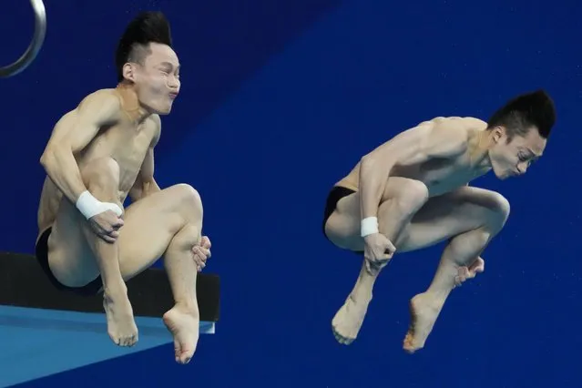 China's Yang Hao and Lian Junjie compete during the men's synchronized 10m platform diving final of the 19th Asian Games in Hangzhou, China, Sunday, October 1, 2023. (Photo by Aaron Favila)/AP Photo