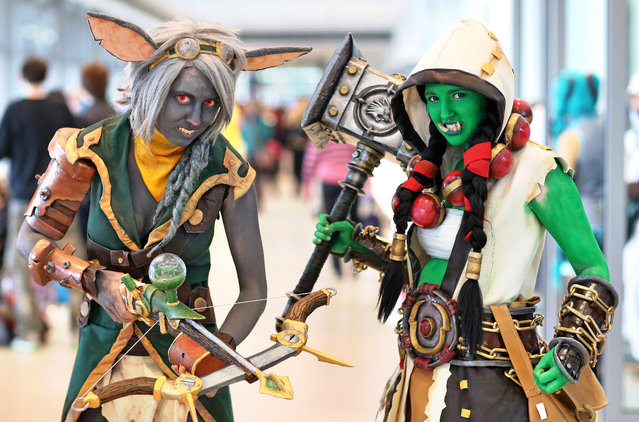“Cosplay” fans pose for a photo as they attend the Leipzig Book Fair on March 14, 2015. The Leipzig book fair hosts 2,263 exhibitors from 42 countries and will take place till March 15, 2015. (Photo by Jan Woitas/AFP Photo/DPA)