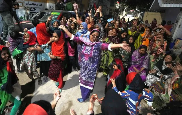 Supporters of Bilawal Bhutto Zardari, Chairman of Pakistan People's Party dance to celebrate their party victory in initial results of the country's parliamentary election, in Karachi, Pakistan, Friday, February 9, 2024. (Photo by Fareed Khan/AP Photo)