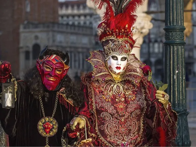 St Mark’s Square is the centre of Carnival activities, and that’s where the most extraordinary costumes can be spotted. (Photo by Marco Secchi/Getty Images)
