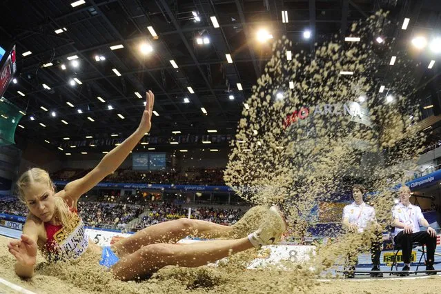 Russia's Darya Klishina competes in the Women Long Jump final event at the IAAF World Indoor Athletics Championships in the Ergo Arena in the Polish coastal town of Sopot, on March 9, 2014. (Photo by Johannes Eisele/AFP Photo)