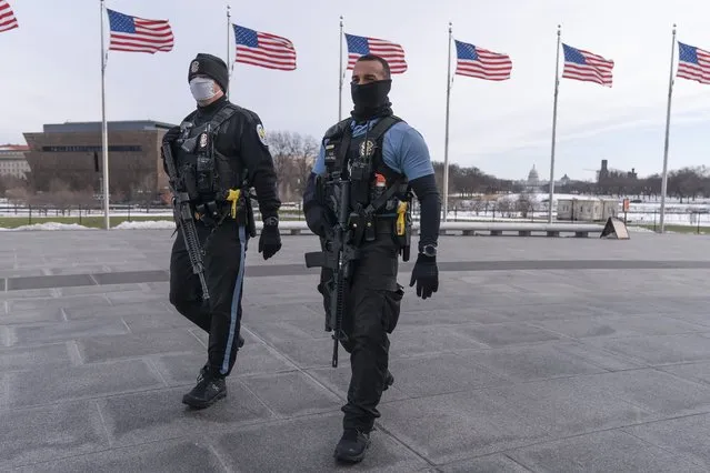 A year after the attack on the U.S. Capitol, U.S. Park Police patrol the National Mall, with the Capitol in the background, in Washington on January 6, 2022. Thursday marks the first anniversary of the Capitol insurrection, a violent attack that has fundamentally changed Congress and prompted widespread concerns about the future of American democracy. (Photo by Jacquelyn Martin/AP Photo)