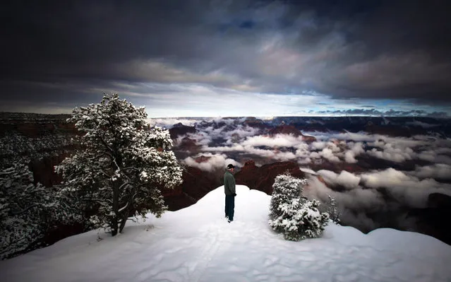 Ken Swigart, 52, stares off into the Grand Canyon; the place where the Flagstaff Community Toys For Tots Organization will deliver toys to the children of the Havasupai tribe. Swigart, a retired Navy lieutenant commander, and others join annually with U.S. Marines to deliver toys to the Native American tribe. (Photo by Sgt. A.J. Parson/HMM-764)