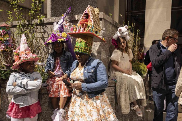 People in costumes are pictured during the annual Easter Parade and Bonnet Festival on 5th Ave in New York, Sunday, April 9, 2023. (Photo by Yuki Iwamura/AP Photo)