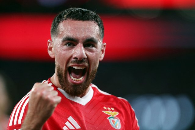 Benfica's Turkish midfielder #10 Orkun Kokcu celebrates scoring the opening goal during the Portuguese League football match between SL Benfica and CF Estrela da Amadora at the Luz stadium in Lisbon, on August 24, 2024. (Photo by Carlos Costa/AFP Photo)