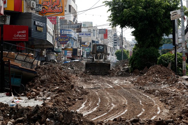 Israeli bulldozers destroy streets and shops during the fifth day of an Israeli military operation in the West Bank city of Jenin, 01 September 2024. According to the Palestinian Health Ministry, at least 24 Palestinians have been killed since Israeli military operations started on 28 August 2024 in the West Bank cities of Tulkarem, Jenin, and Tubas. The Israeli army said that it's conducting a large-scale counterterrorism operation in several areas. (Photo by Alaa Badarneh/EPA/EFE)