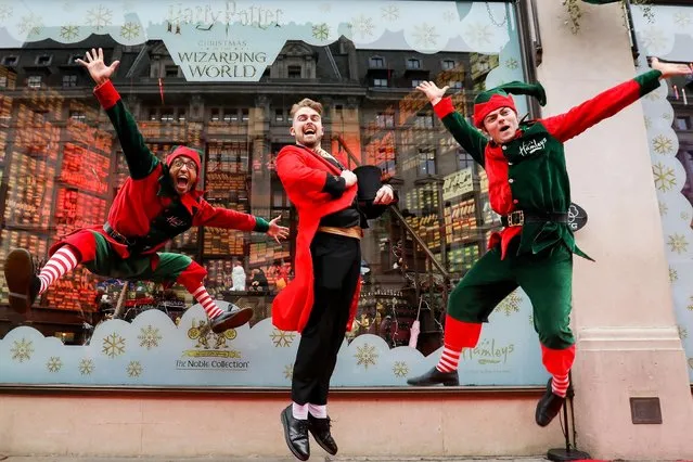 Hamleys Christmas Elves and Ringmaster perform as world-famous toy shop Hamleys unveils its Christmas windows on November 04, 2021 in London, England. (Photo by Tristan Fewings/Getty Images for Hamleys)