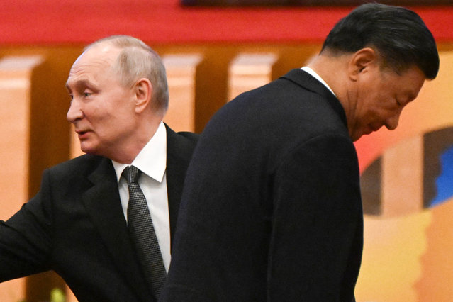 China's President Xi Jinping (R) and Russia's President Vladimir Putin attend the opening ceremony of the third Belt and Road Forum for International Cooperation at the Great Hall of the People in Beijing on October 18, 2023. (Photo by Pedro Pardo/AFP Photo)