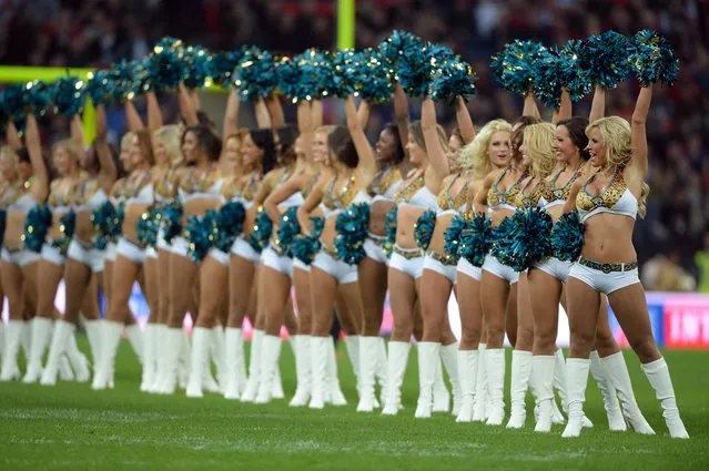 October 27, 2013; London, UK; Jacksonville Jaguars cheerleaders perform during an International Series game against the San Francisco 49ers at Wembley Stadium. (Photo by Bob Martin/USA TODAY Sports)