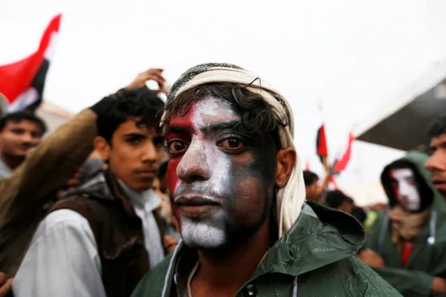 A man with his face painted in the colors of Yemen's national flag attends a rally held by supporters of Houthi rebels and Yemen's former president Ali Abdullah Saleh to celebrate an agreement reached by Saleh and the Houthis to form a political council to unilaterally rule the country, in Sanaa, Yemen August 1, 2016. (Photo by Khaled Abdullah/Reuters)