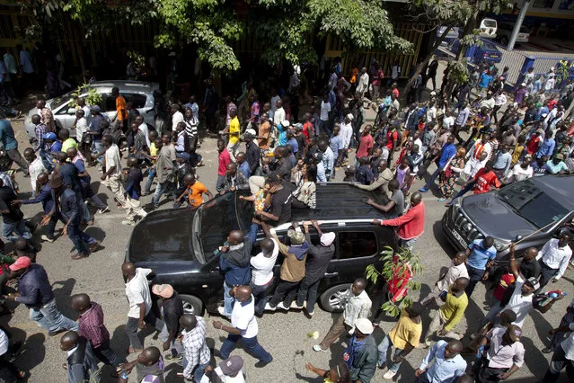 National Super Alliance (Nasa) supporters demonstrate in Nairobi, Kenya, Wednesday October 11, 2017. (Photo by Sayyid Abdul Azim/AP Photo)