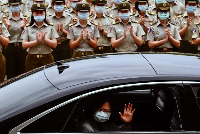 Taiwan President Tsai Ing-wen waves after inspecting the military police headquarters in Taipei on May 26, 2020. (Photo by Sam Yeh/AFP Photo)