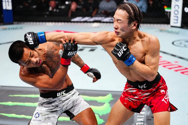 (R-L) Rei Tsuruya of Japan punches Joshua Van of Myanmar in a flyweight fight during the UFC 313 event at T-Mobile Arena on March 08, 2025 in Las Vegas, Nevada. (Photo by Jeff Bottari/Zuffa LLC)