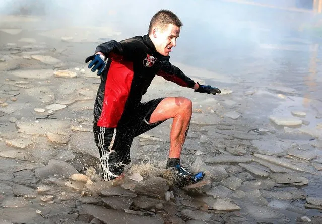 A competitor in action during the Tough Guy Challenge on January 27, 2013 in Telford, England.  (Photo by Ian Walton)
