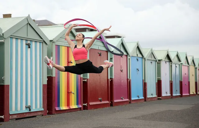 Team GB Rhythmic Gymnast Lynne Karina Hutchison during a training session on the seafront in Hove, following the outbreak of the coronavirus disease (COVID-19), Hove, Britain, June 10, 2020. (Photo by Peter Cziborra/Reuters)