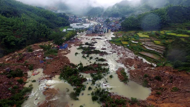 The site of a landslide caused by heavy rains brought by Typhoon Megi, in Sucun Village, Lishui, Zhejiang province, China, September 29, 2016. (Photo by Reuters/China Daily)