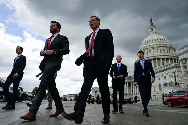 U.S. Senators J.D. Vance (R-OH), John Barrasso (R-WY) and Rick Scott (R-FL) walk to a press conference to call on U.S. President Joe Biden to negotiate with Republicans in order to make a deal on raising the debt ceiling on Capitol Hill in Washington, U.S., May 3, 2023. (Photo by Craig Hudson/Reuters)