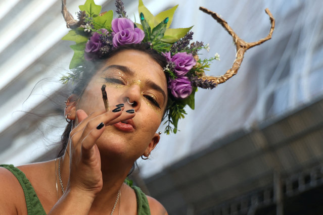 A reveler takes part in the unofficial kick off of Rio's Carnival with the weed block parade performance by “Bloco Planta na mente”, in Rio de Janeiro, Brazil on January 5, 2025. (Photo by Aline Massuca/Reuters)