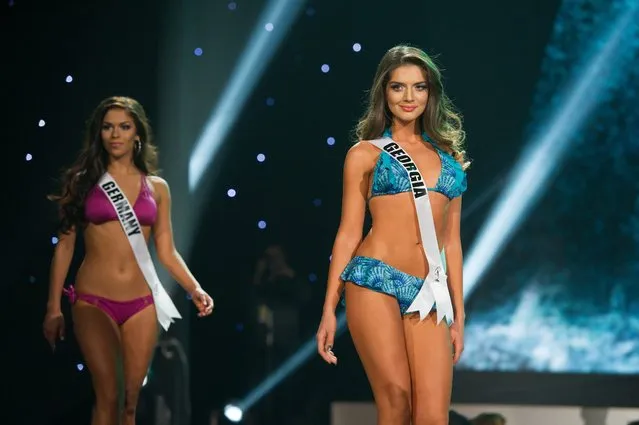 A handout image provided by the Miss Universe Organization on 17 December 2015 shows Sarah-Lorraine Riek (Front), Miss Germany 2015 and Janet Kerdikoshvili, Miss Georgia 2015 competing on stage in Yamamay swimwear featuring footwear by Chinese Laundry at Planet Hollywood Resort and Casino in Las Vegas, Nevada, USA, 16 December 2015. The 2015 Miss Universe contestants are competing for the crown in Las Vegas on 20 December. (Photo by Darren Decker/EPA)