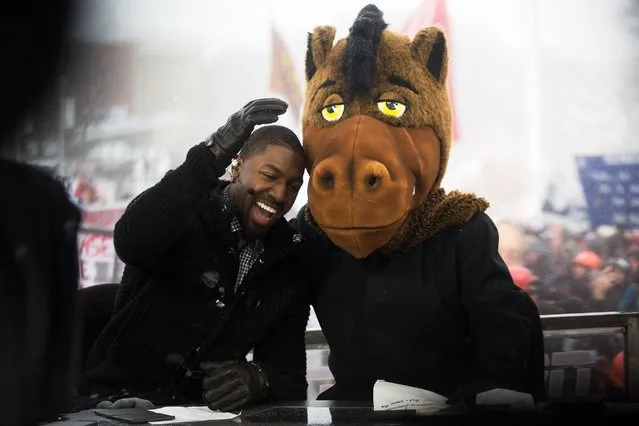 Kalamazoo native Gregg Jennings, left, and Lee Corso both select Western Michigan to defeat Buffalo in a NCAA college football game during a broadcast for ESPN's “College GameDay” in Kalamazoo, Mich., Saturday, November 19, 2016. (Photo by Bryan Bennett/Kalamazoo Gazette-MLive Media Group via AP Photo)