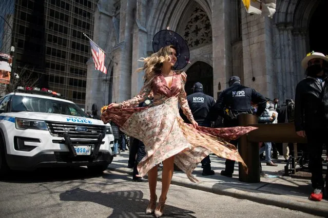 A woman attends the annual Easter Parade and Bonnet Festival on Fifth Avenue, amid the coronavirus disease (COVID-19) pandemic, in New York City, U.S., April 4, 2021. (Photo by Eduardo Munoz/Reuters)