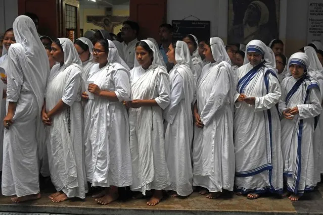 Nuns from Missionaries of Charity attend a special prayer on the occasion of 'Feast Day' to mark the death anniversary of Mother Teresa at the Mother House in Kolkata on September 5, 2023. (Photo by Dibyangshu Sarkar/AFP Photo)