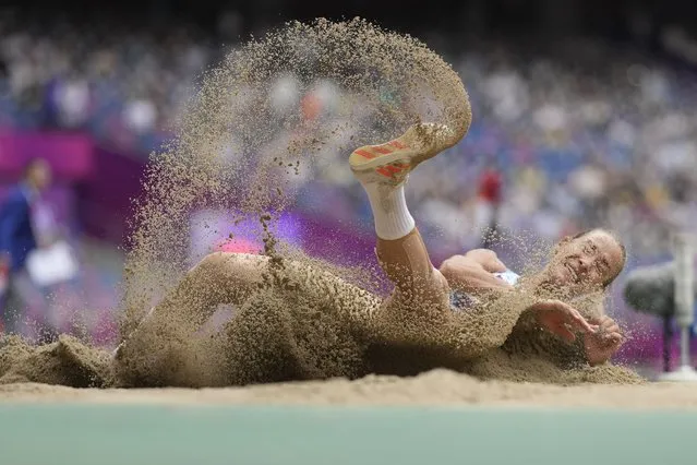 Uzbekistan's Ekaterina Voronina competes during the women's heptathlon long jump at the 19th Asian Games in Hangzhou, China, Sunday, October 1, 2023. (Photo by Lee Jin-man/AP Photo)