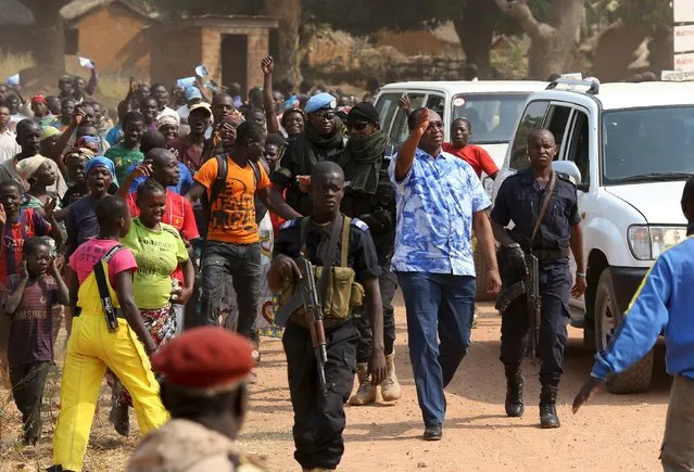 Presidential candidate Anicet-Georges Dologuele (2nd R) greets supporters as he campaigns ahead of Sunday's second round election against Faustin-Archange Touadera, in the town of Bouar in the west of the Central African Republic, February 11, 2016. (Photo by Siegfried Modola/Reuters)