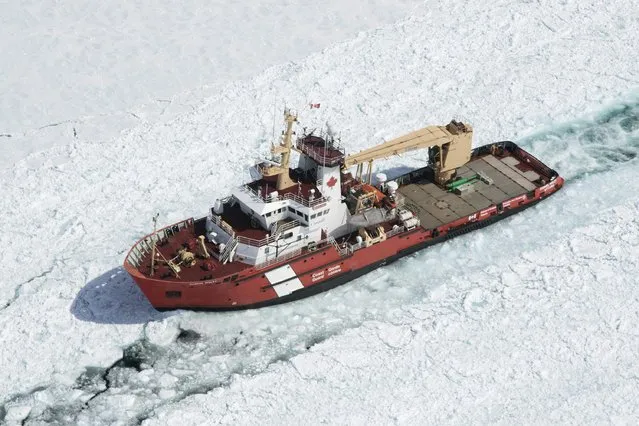 The Canadian Coast Guard Ship (CCGS) Samuel Risley is shown in this aerial photo near Whitefish Bay on Lake Superior northwest of Sault Ste. Marie, Ontario April 7, 2015. (Photo by Kenneth Armstrong/Reuters)