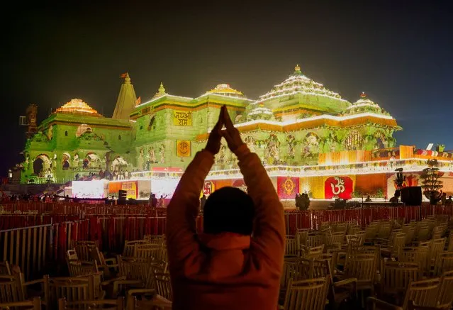 A Hindu devotee prays near the Lord Ram temple after its inauguration, in Ayodhya, India on January 22, 2024. (Photo by Adnan Abidi/Reuters)