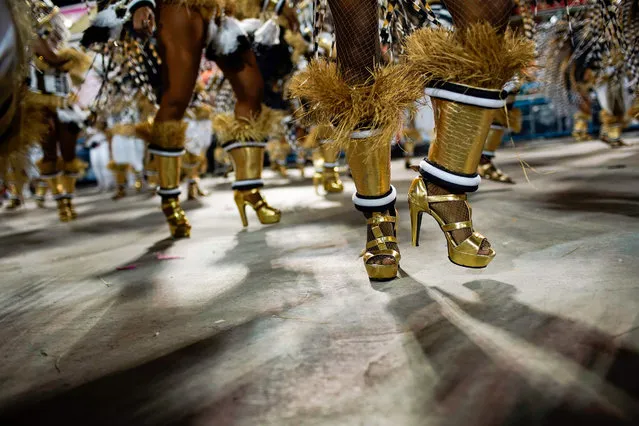 Shoes of members of Mangueira samba school performing are pictured during the second night of Rio's Carnival parade at the Sambadrome in Rio de Janeiro, Brazil on March 5, 2019. (Photo by Mauro Pimentel/AFP Photo)