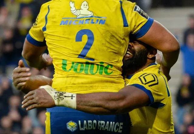 Clermont's Fijian flanker Peceli Yato (R) celebrates after scoring a try during the French Top 14 rugby union match between ASM Clermont Auvergne and Lyon Olympique Universitaire Rugby at the Marcel-Michelin Stadium in Clermont-Ferrand, central France, on February 3, 2024. (Photo by Guillaume Souvant/AFP Photo)