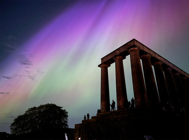 The aurora borealis, also known as the northern lights, above  Edinburgh, Scotland. on Friday, May 10, 2024. (Photo by Jacob Anderson)