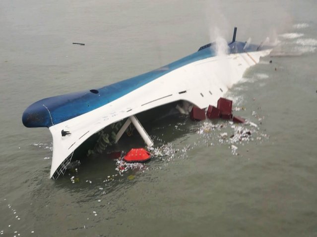 South Korean ferry “Sewol” is seen sinking in the sea off Jindo April 16, 2014, in this picture provided by Korea Coast Guard and released by Yonhap. (Photo by /Reuters/Yonhap/Korea Coast Guard)
