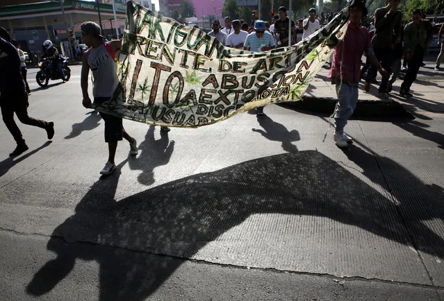 Demonstrators taken part during a rally for the legalization of marijuana in Mexico City, Mexico, May 7, 2016. (Photo by Henry Romero/Reuters)