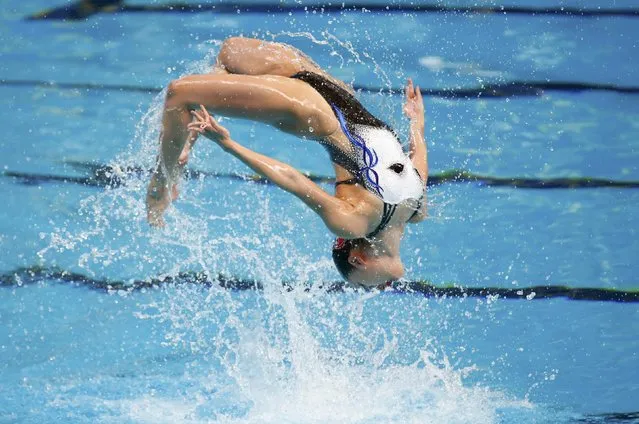 Atsushi Abe and Yumi Adachi from Japan perform in the synchronised swimming mixed duet technical routine preliminary at the Aquatics World Championships in Kazan, Russia July 25, 2015. (Photo by Michael Dalder/Reuters)