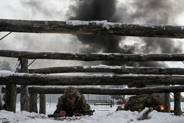 Ukrainian service members attend military exercises during drills at a training ground, amid Russia's attack on Ukraine, in Chernihiv region, Ukraine, on November 22, 2024. (Photo by Maksym Kishka/Reuters)