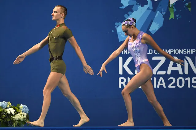 Russia's mixed duet Aleksandr Maltsev and Darina Valitova compete in the Mixed Duet Technical final during the synchronised swimming competition at the 2015 FINA World Championships in Kazan on July 26, 2015. (Photo by Christophe Simon/AFP Photo)