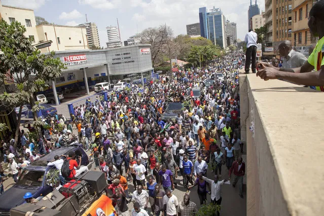 National Super Alliance (NASA) supporters demonstrate in Nairobi, Kenya, Wednesday October 11, 2017. (Photo by Sayyid Abdul Azim/AP Photo)