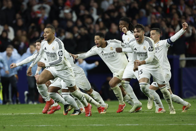 Players of Real Madrid celebrate winning the penalty shoot-out of the UEFA Champions League round of 16 second leg soccer match between Atletico Madrid and Real Madrid in Madrid, Spain, 12 March 2025. (Photo by Juanjo Martin/EPA)