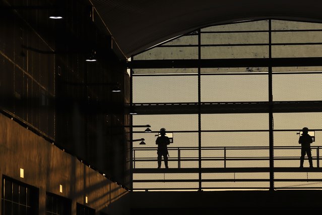 Correctional officers stand guard at the Terrorist Confinement Center in Tecoluca, El Salvador, Friday, April 4, 2025, during a tour by Costa Rica Justice and Peace minister. (Photo by Salvador Melendez/AP Photo)