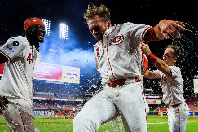 Cincinnati Reds pinch hitter Gavin Lux is doused by teammates after hitting a walk-off single to defeat the New York Yankees in a Major League Baseball game in Cincinnati on Tuesday, June 24, 2025. (Photo by Katie Stratman/Imagn Images via Reuters)
