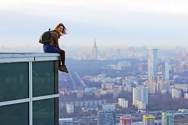 An astonishing set of snaps of a thrill-seeker's sky-high catwalk show on the edge of some of the world's tallest buildings has turned her into a social media sensation. Daredevil Angelina Nikolau, 23, from Russia, has spent weeks travelling around China and Hong Kong posing for jaw-dropping skyscraper selfies hundreds of feet above the ground. Her vertigo inducing results – uploaded to Instagram – have made her an instant star on the internet. Angelina is described by Russian media as “self-taught photographer, adventurer and roofer from Moscow”. (Photo by Kirill Oreshkin/CEN)