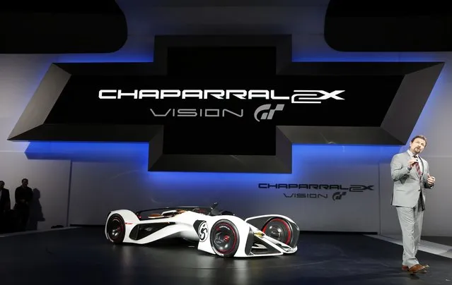 Clay Dean, Executive Director of Advanced Design for Chevrolet, speaks about the Chevorlet Chaparral 2X Vision Gran Turismo concept car at its world debut at the Los Angeles Auto Show in California, November 19, 2014. (Photo by Lucy Nicholson/Reuters)