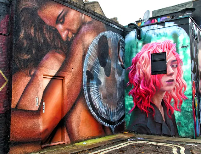 A piece of street art of two girls on Hawley Street in London, United Kingdom on September 23, 2020. A huge variety of Street Art of all kinds can be found almost around every corner in one of London's artistic and cultural hotbeds of Camden Town. (Photo by Keith Mayhew/SOPA Images/LightRocket via Getty Images)