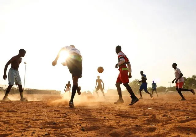 Young men play soccer at Ribadu Square two days after Nigeria's presidential election as the country waits for its results, in Yola, Nigeria on February 27, 2023. (Photo by Esa Alexander/Reuters)