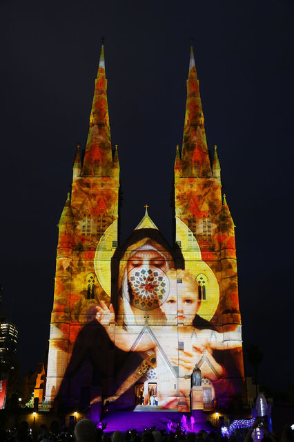 St Mary's Cathedral is illuminated as part of a Christmas lights display in celebration of Christmas on December 19, 2014 in Sydney, Australia. (Photo by Brendon Thorne/Getty Images)